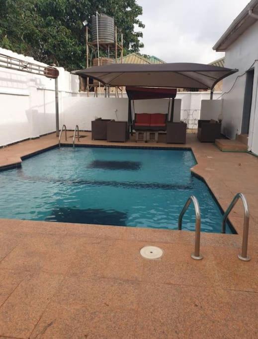 Stylish House With Free Parking And Outdoor Pool Villa Abuja Exteriör bild